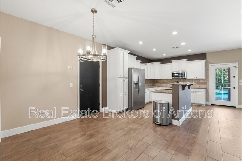 Luxury Gilbert Rental | Pool, 4-Car Garage, Solar + BBQ Setup property image