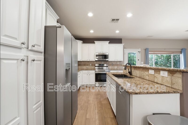 Luxury Gilbert Rental | Pool, 4-Car Garage, Solar + BBQ Setup property image